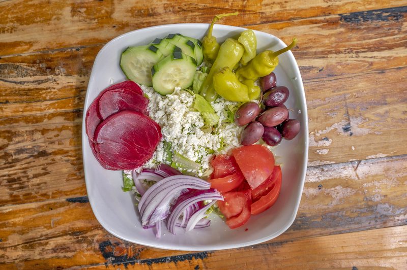 Greek salad with feta, beets, kalamata olives, pepperoncini and cucumber